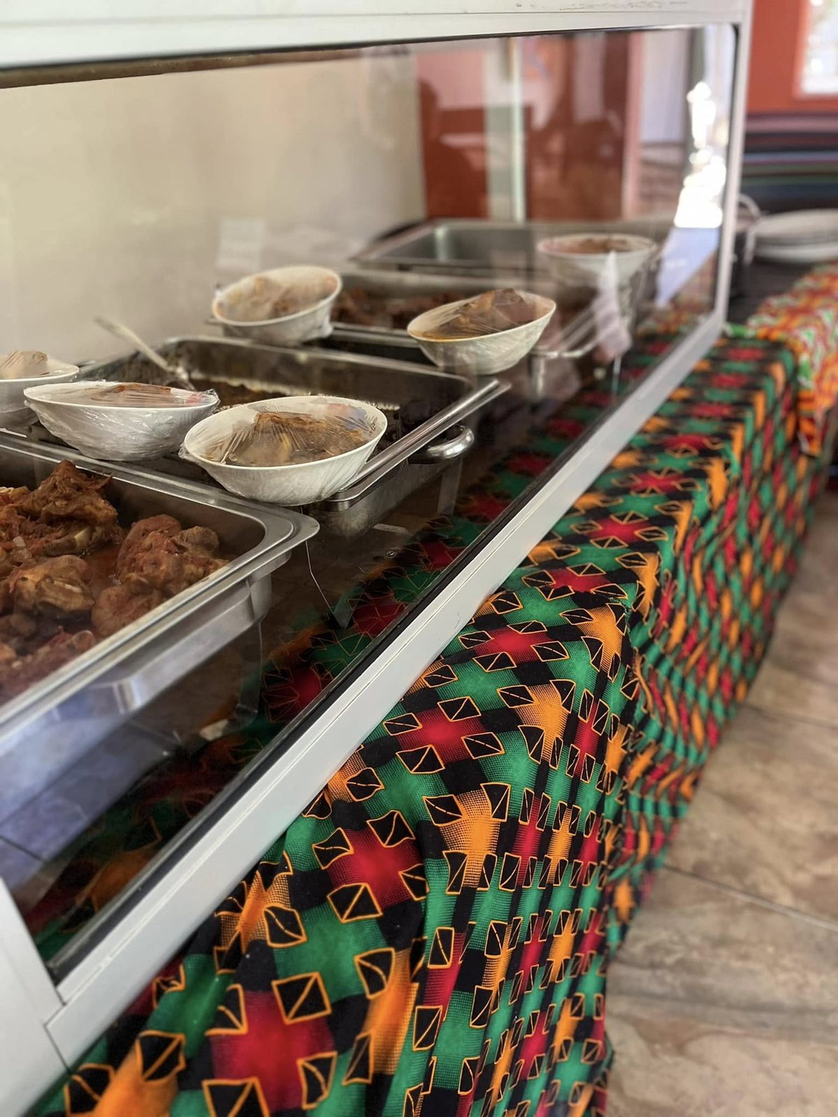 The serving counter with a chitenge cloth