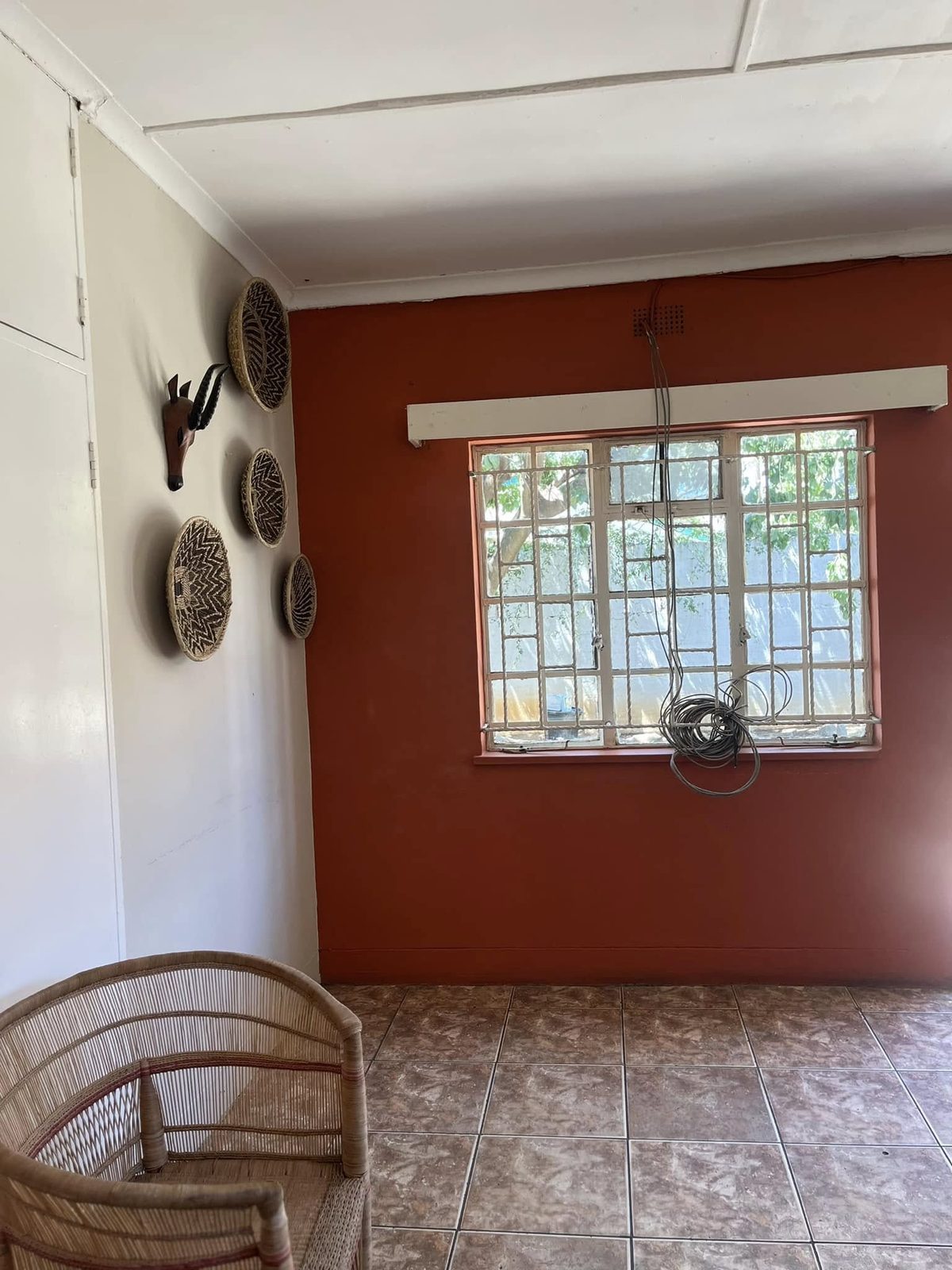 Indoor dining room with orange walls