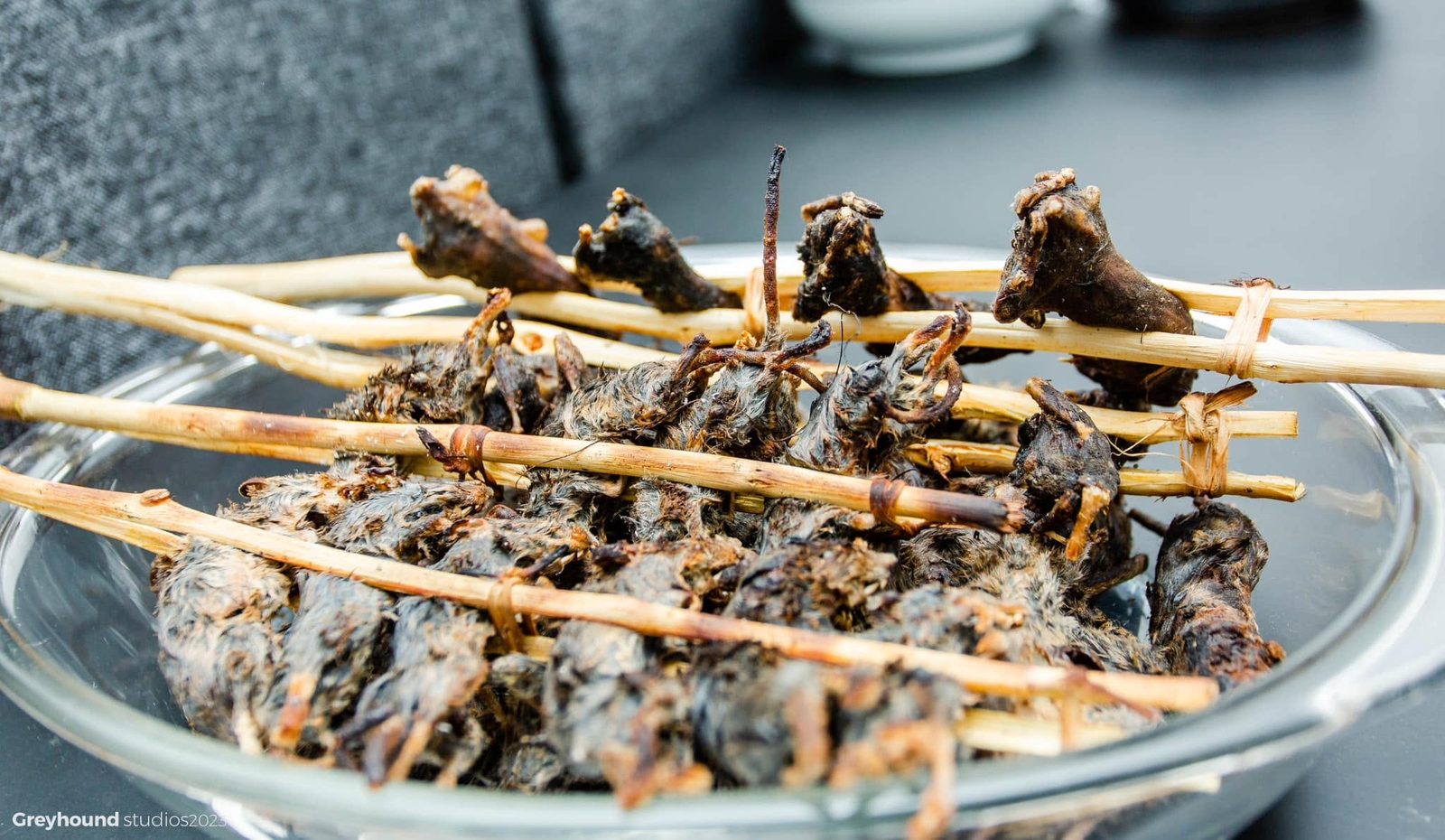 Skewered meat on a grill
